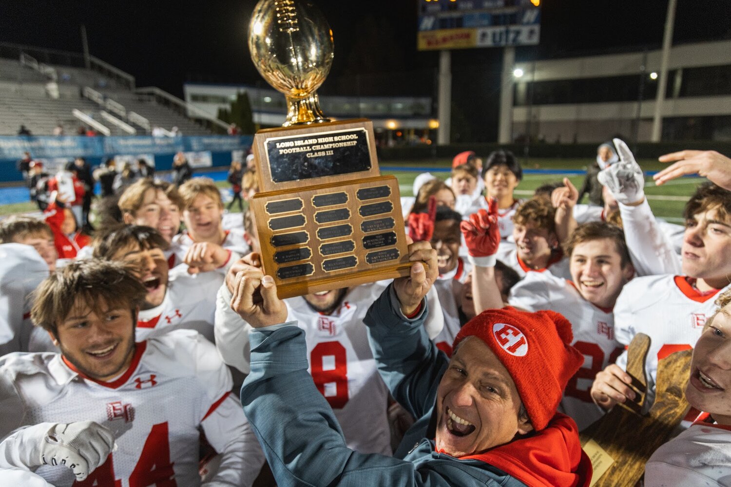 EI pride filled the air as the Redmen accepted their trophy following their monumental win, securing their title of Long Island High School Football Division III Champions.